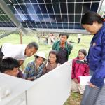 Solar-powered lift irrigation system lifts young farmer from stream-side trek to operator's seat
