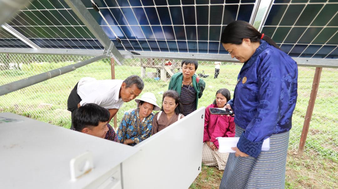 Solar-powered lift irrigation system lifts young farmer from stream-side trek to operator's seat